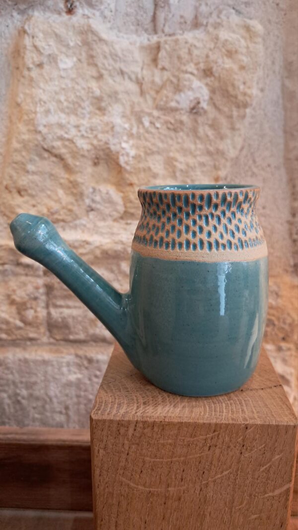 Lota bleu verte présenté de profil